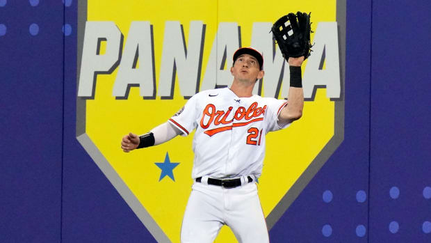 Austin Hays makes the catch on a fly ball hit by Boston Red Sox’s Alex Verdugo while wearing a microphone and talking with the ESPN broadcasters during the third inning of the MLB Little League Classic baseball game in Williamsport, Pa., Sunday, Aug. 21, 2022.